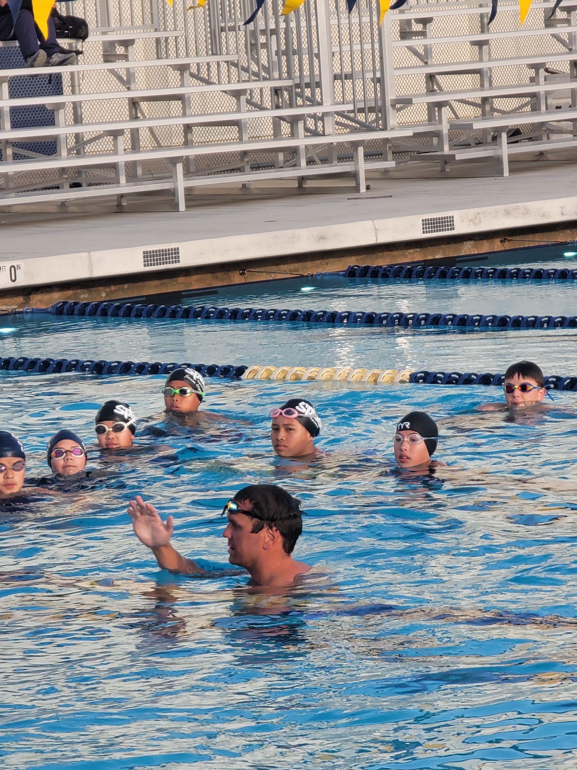 Tom teaching technique in the water